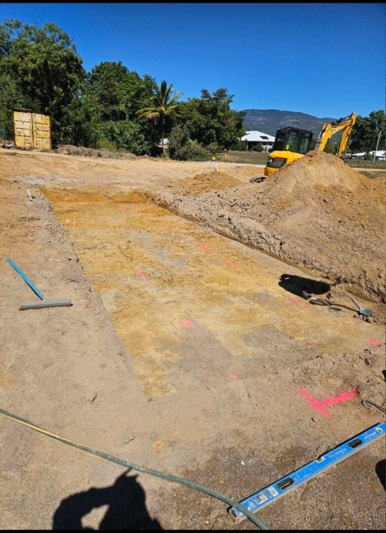 Excavation site with earthmoving equipment
