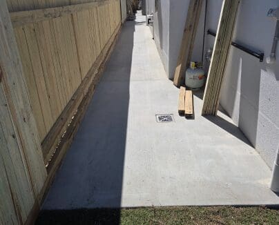 Concrete pathway construction between buildings